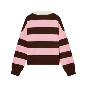 Detail of pink and brown striped polo knit sweater with white collar and premium texture