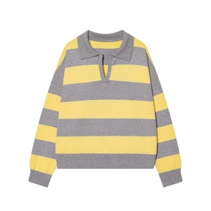 Detail of yellow and gray striped knit polo shirt showing textured fabric and collar