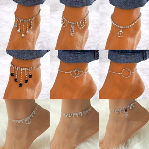 Bohemian silver rhinestone anklet set with crystal tassels and moon pendants on white fur