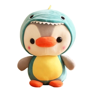 Cute penguin plush toy dressed in a green dinosaur costume made of soft fabric