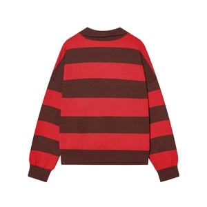 Detail view of the back of a striped knit polo sweater with ribbed collar and cuffs