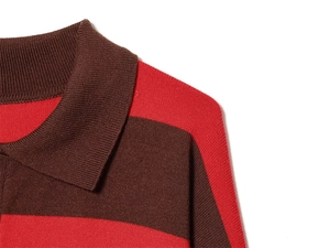 Close-up of the ribbed polo collar and striped knit texture of the brown sweater
