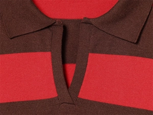 Close-up of knit Polo collar with brown and red horizontal stripes and V-neckline detail