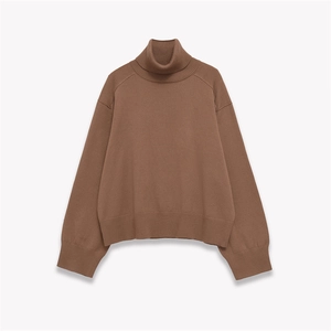 Brown wool long sleeve knit sweater with soft turtleneck and loose casual silhouette
