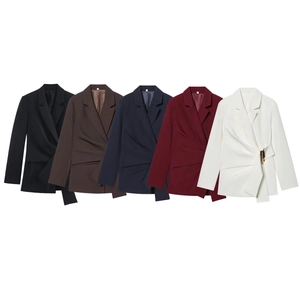 Detailed close-up of women's fitted blazers showing waist buckle and pleated design details