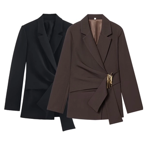 Detail of waist buckle and drape on black and brown professional women's blazers