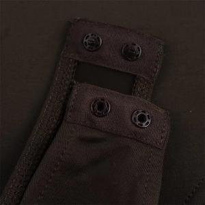 Detail of snap button closure on dark brown long sleeve bodysuit with reinforced stitching