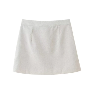 Detailansicht eines beigen A-Linien-Rocks aus Baumwollleinen mit hoher Taille und Struktur