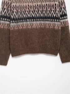 Detailed view of the vintage brown knit sweater with colorful Fair Isle jacquard patterns