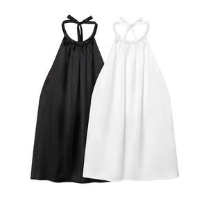 Elegantes blusas de satén sin mangas con cuello halter en blanco y negro con lazo plisado