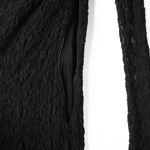 Close-up of intricate black floral lace texture and invisible side zipper on dress