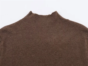 Detail of coffee brown knit sweater featuring high-quality ribbed mock neck collar