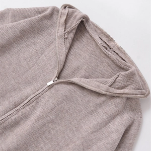 Women's autumn solid color oatmeal knit cardigan with a half-zip neckline and hood