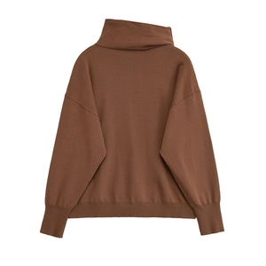 Women's loose knit sweater in deep brown featuring a turtleneck and ribbed cuffs design