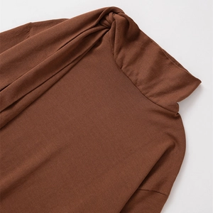 Women's dark brown turtleneck knit sweater with twist knot collar detail and long sleeves
