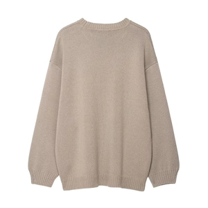 Minimalist loose long sleeve knitted sweater in beige with ribbed cuffs and drop shoulder