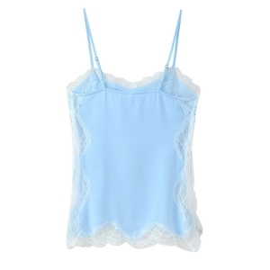 Detail of light blue camisole top featuring delicate white floral lace trims and smooth fabric