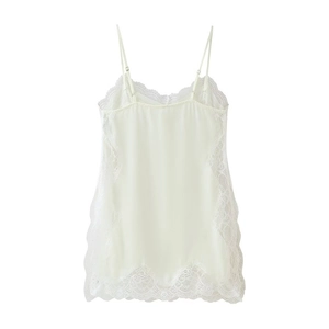 Detailed view of white satin camisole with delicate lace trim and adjustable straps