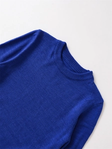 Detail of the crew neck and fine knit texture of this royal blue cashmere wool sweater