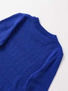 Detailed view of the royal blue cashmere blend knit sweater with ribbed crew neck detail