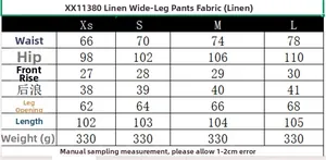 Detailed size chart for linen wide-leg trousers including waist and length measurements
