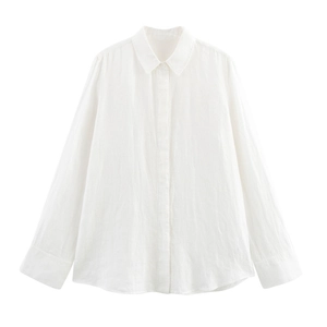Detailed view of the button placket and natural linen texture of a white long-sleeve shirt