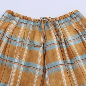 Plaid ramie lantern pants for women with elastic waist and drawstring closure details