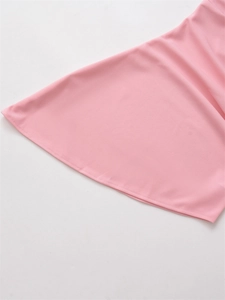 Detail of pink slim fit top showing fine rolled hem stitching and smooth fabric texture