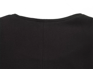 Macro shot of black round neck jacket with detailed twill fabric and reinforced stitching