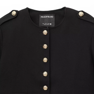 Women's minimalist black cropped twill jacket with military-style gold embossed buttons