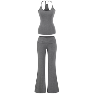 Deep grey two-piece slimming yoga set featuring a racerback tank top and flare yoga pants