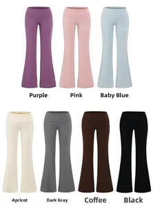 Detail view of high-waist flare yoga pants in multiple colors with elastic knit fabric