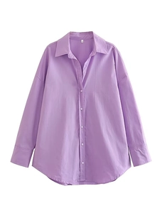 Detailed close-up of a purple poplin shirt featuring a classic collar and single-breasted front