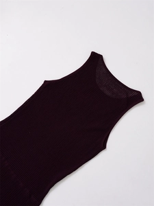 Detailed texture of dark purple ribbed knit fabric on a sleeveless round neck dress