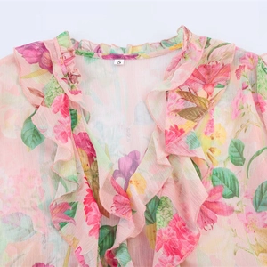 Pink floral chiffon blouse featuring a V-neck design and elegant double-layered ruffles