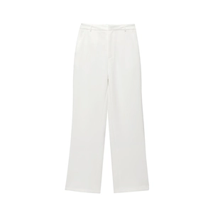 Detail view of high-waisted white straight-leg trousers with elegant drape and clean seams