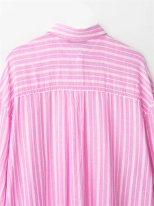 Close-up of pink and white striped shirt back featuring inverted pleat and cotton texture