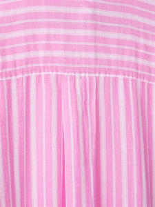 Detailed macro view of the seamless stitching and pink striped fabric texture