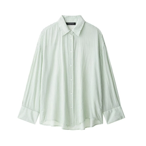 Close-up of the light green striped shirt fabric texture and classic button-down collar