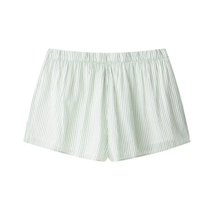 Detail of light green striped loungewear shorts with a comfortable elastic waistband