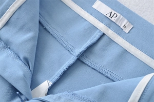 Detailed macro view of the interior waistband with high-quality stitching and brand label