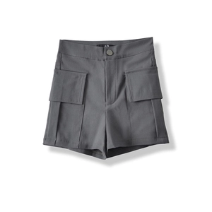 Detail of high-waist dark grey cargo shorts with metal button and flap pockets