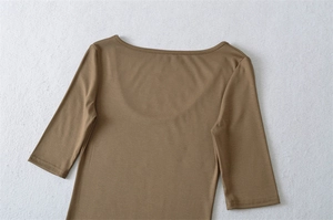 Detail view of deep U-neck back design on a stretchy khaki slim fit basic t-shirt