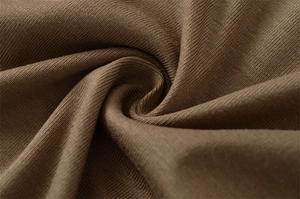 Close-up of taupe ribbed knit fabric texture showing vertical stripes and elastic material