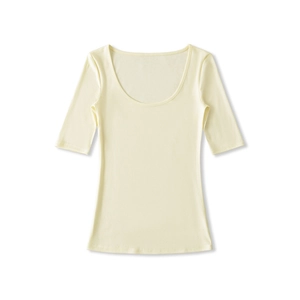 Detail of slim fit scoop neck half-sleeve top in cream color with elastic fabric texture