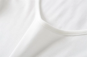 Close-up of the reinforced round neckline stitching on a white stretch slim-fit T-shirt