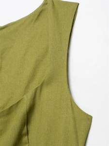 Macro shot of olive green linen fabric texture and fine stitching detail on summer dress