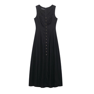 Close-up of square neck sleeveless black linen dress with golden button details