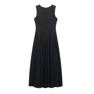 Detail of the invisible back zipper and fine texture on a black linen midi dress