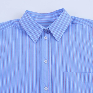 Detail of vintage striped cotton shirt collar and button-down front with chest pocket